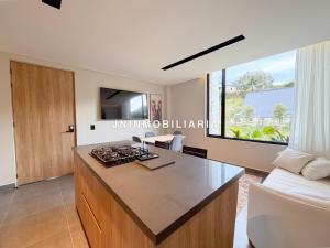 TV a/nebo společenská místnost v ubytování Apartamento de lujo a 3 minutos del Aeropuerto JMC 201