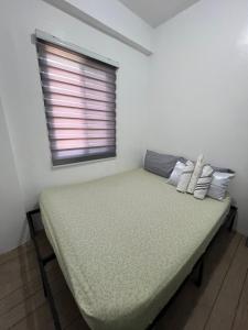 Ένα ή περισσότερα κρεβάτια σε δωμάτιο στο SAN JOSE DEL MONTE BULACAN GUMAOK West,Delgados Place UNIT 2