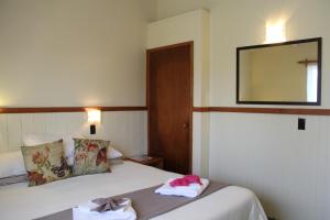 Postel nebo postele na pokoji v ubytování Saints Apartment - Free unlimited WIFI