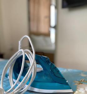 a close up of a pair of wires on a table at Gem Hostel in Cat Ba