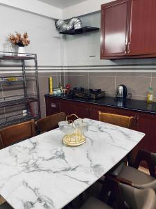 Η κουζίνα ή μικρή κουζίνα στο Gem Hostel