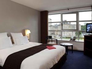 Postel nebo postele na pokoji v ubytování Hôtel Mercure Thionville Centre Porte du Luxembourg