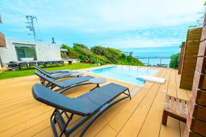 Bazén v ubytování Moroisoso モロイソソウ 大型温水プール付 高級貸切ヴィラ BBQ＆プライベートビーチ nebo v jeho okolí