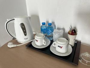 Příslušenství pro přípravu čaje a kávy v ubytování Happy Fish Guesthouse + 20 fotografií