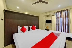 Postel nebo postele na pokoji v ubytování Hotel O Le Serenity Beach View Resort