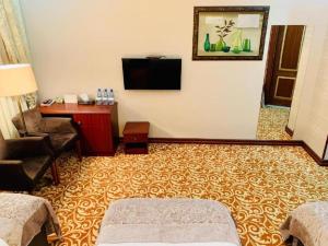 Μια τηλεόραση ή/και κέντρο ψυχαγωγίας στο Clover Hotel