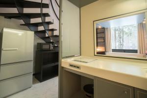 Η κουζίνα ή μικρή κουζίνα στο 星野度假村Village Alpha Tomamu复式公寓套房 +25 φωτογραφίες