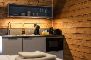 Η κουζίνα ή μικρή κουζίνα στο Silencius Cabin With Private Jacuzzi +19 φωτογραφίες