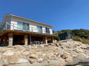 a house on top of a pile of rocks at Ciel Bleu in Yamaguchi