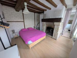 Кровать или кровати в номере maison