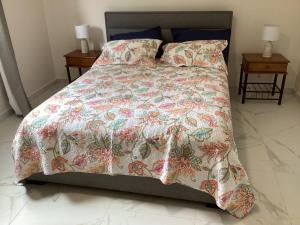 Postel nebo postele na pokoji v ubytování Malanda Falls Retreat