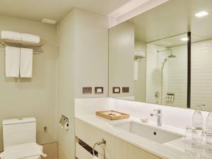 Koupelna v ubytování Pullman Pattaya Hotel G