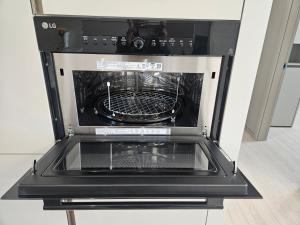 Kuchyň nebo kuchyňský kout v ubytování 인덕원스테이 27 + 21 fotografií