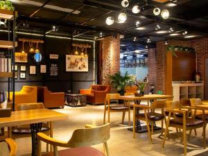 Χώρος καθιστικού στο James Joyce Coffetel· Wuhan Wangjiawan Taojialing Metro Station