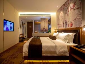 Μια τηλεόραση ή/και κέντρο ψυχαγωγίας στο James Joyce Coffetel· Wuhan Wangjiawan Taojialing Metro Station