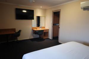 Μια τηλεόραση ή/και κέντρο ψυχαγωγίας στο SunPalms Motel