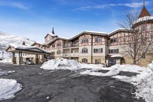 a large building with snow in front of it at Zermatt 2BR Family Villa Near Deer Valley & Park City Ski Resorts - 2022 in Mound City