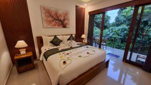 Postel nebo postele na pokoji v ubytování Asna House