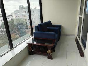 Posezení v ubytování Hotel O Trinetra Stay In Luxury