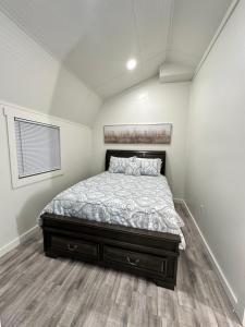 Ένα ή περισσότερα κρεβάτια σε δωμάτιο στο The Magnolia Shedhaus