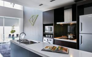 Citadines Fusionopolis Singapore的厨房或小厨房