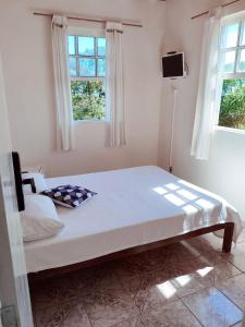 Postel nebo postele na pokoji v ubytování Code In Hospedaria