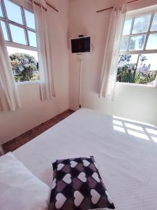 Postel nebo postele na pokoji v ubytování Code In Hospedaria