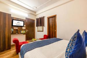 Postel nebo postele na pokoji v ubytování FabHotel Airport Sinon + 51 fotografií