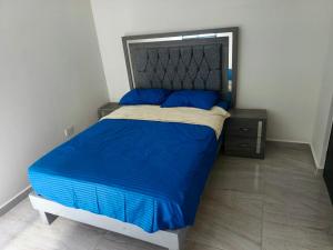 Ένα ή περισσότερα κρεβάτια σε δωμάτιο στο Torre luna INT 8