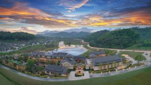an aerial view of a resort with a river at The Mulian Hotel in Dayi