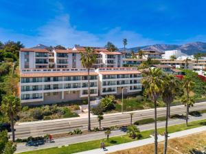 an aerial view of a building with palm trees at Beachfront Hideaway in Santa Barbara