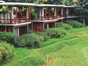 a house with a garden in front of it at Veranda High Resort Chiang Mai - MGallery Collection, Accor Hotel in Hang Dong +99 photos