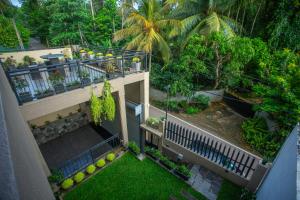 Κήπος έξω από το The Moonz Villa