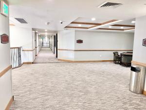 an empty hallway of a office building with a long corridor at Family Zermatt 2BR Villa Near Park City & Deer Valley Ski Resorts - 3739 in Mound City +31 photos