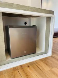 a large glass door in a room with a wooden floor at Hello Mirissa in Mirissa