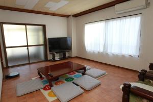 Μια τηλεόραση ή/και κέντρο ψυχαγωγίας στο 貸切ゲストハウス みなと家