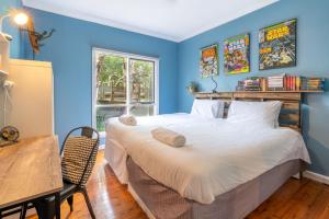 Postel nebo postele na pokoji v ubytování Kareela Winds