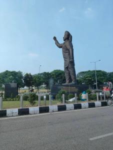 a statue of a man standing next to a road at Mahadev Home Stay !! Best Homestay Near Chandigarh Int'l Airport !! in Chandigarh Airport +7 photos