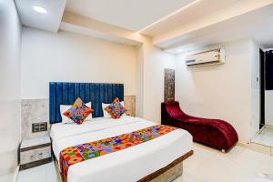 Postel nebo postele na pokoji v ubytování FabHotel Malva + 22 fotografií