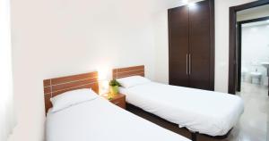Ένα ή περισσότερα κρεβάτια σε δωμάτιο στο Andorra4days Canillo