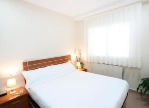 Ένα ή περισσότερα κρεβάτια σε δωμάτιο στο Andorra4days Canillo