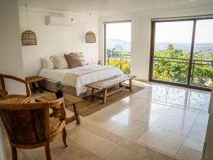 Ένα ή περισσότερα κρεβάτια σε δωμάτιο στο Oniro Guest House +63 φωτογραφίες