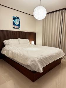 Voodi või voodid majutusasutuse Stay Moonlight N401 Jinju Castle Jinyangho Park Yudeung Museum Jinju National University of Education Jinju Health University Gyeongsang National University Jinju Court toas