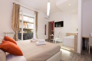 Giường trong phòng chung tại Luxury House Vaticano