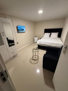 Postel nebo postele na pokoji v ubytování Joy House