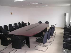 a conference room with a table and chairs at Jinjiang Inn Weihai High Speed Qingdao South Road in Weihai