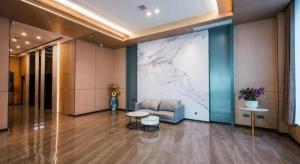 a large map on a wall in a lobby at Kaibin International Hotel Jingdezhen in Jingdezhen +250 photos