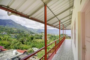 Fotografie z fotogalerie ubytování Hotel O Lulu Home v destinaci Munnar