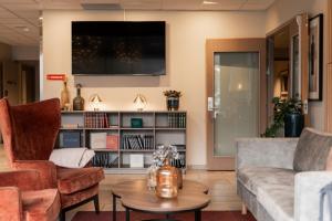 TV/trung tâm giải trí tại Home Hotel Helma