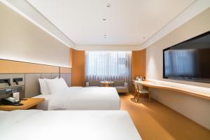 Μια τηλεόραση ή/και κέντρο ψυχαγωγίας στο JI Hotel Shanghai Fengxian New Town Nanfeng Road